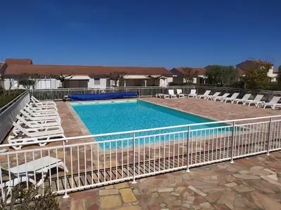 Piscine de l'établissement Mini villa T2, 200 m de la plage, piscine chauffée, jardin ou située à proximité