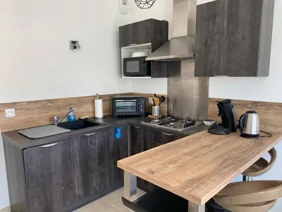 Cuisine ou kitchenette dans l'établissement Aux rivages de Sylvie - 150 m de la plage