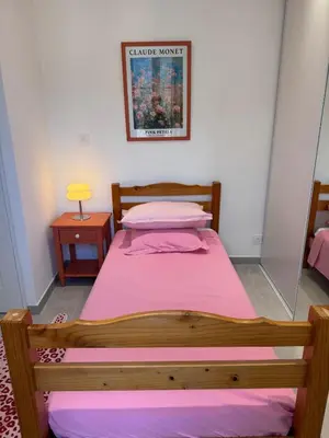 Un ou plusieurs lits dans un hébergement de l'établissement Appartement au cœur du village