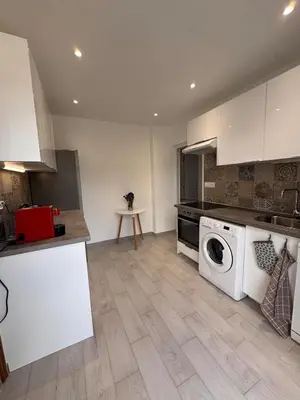 Cuisine ou kitchenette dans l'établissement Appartement au cœur du village