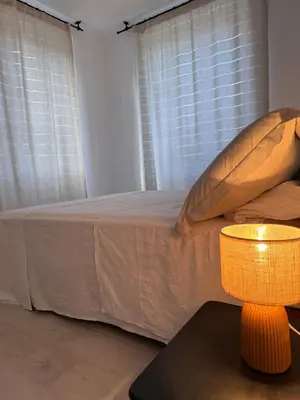 Un ou plusieurs lits dans un hébergement de l'établissement Appartement au cœur du village