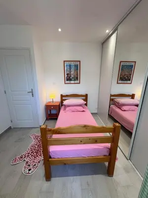 Un ou plusieurs lits dans un hébergement de l'établissement Appartement au cœur du village