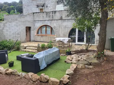 Jardin de l'établissement Appartement calme, authentique et spacieux au pied du GR20