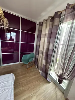 Un ou plusieurs lits dans un hébergement de l'établissement Chambre Lavighiu