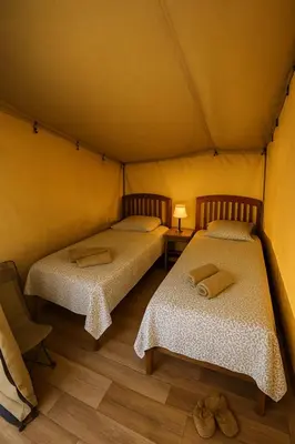Un ou plusieurs lits dans un hébergement de l'établissement Camping Mercone