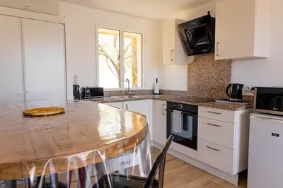 Cuisine ou kitchenette dans l'établissement Domaine de Campu