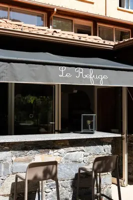 Restaurant ou autre lieu de restauration dans l'établissement Hotel Arena le Refuge