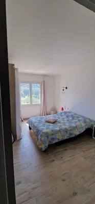 Un ou plusieurs lits dans un hébergement de l'établissement villa terra et mare