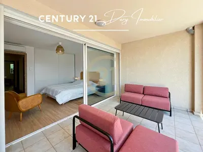 Coin salon dans l'établissement Calvi T3 Les Jasmins proche centre
