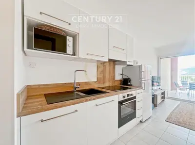 Cuisine ou kitchenette dans l'établissement Calvi T2 les Jasmins proche centre