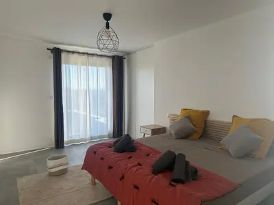 Coin salon dans l'établissement Spacieuse villa standing de 220m2
