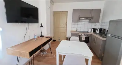 Cuisine ou kitchenette dans l'établissement Charmant Type 2 hyper centre