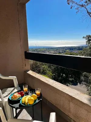 Balcon ou terrasse dans l'établissement Maison avec vue mer