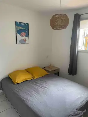 Un ou plusieurs lits dans un hébergement de l'établissement Capra Scorsa, Maison avec spa privatif face plage Lozari, Ile Rousse