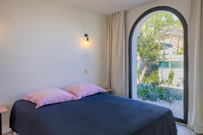 Un ou plusieurs lits dans un hébergement de l'établissement Villa MARLI