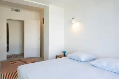 Un ou plusieurs lits dans un hébergement de l'établissement Villa MARLI