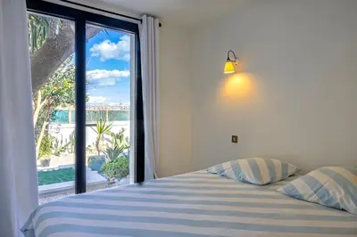 Un ou plusieurs lits dans un hébergement de l'établissement Villa MARLI