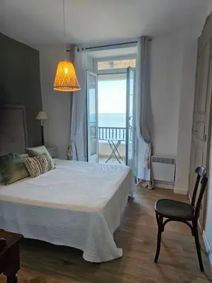 Un ou plusieurs lits dans un hébergement de l'établissement Maison Bella Vista