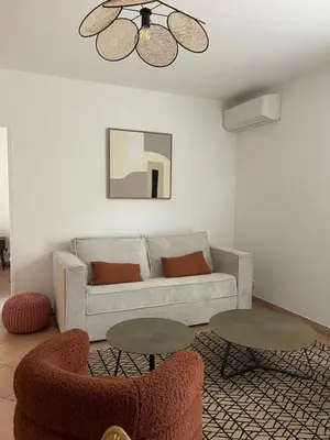 Coin salon dans l'établissement Appartement vue Mer en plein centre
