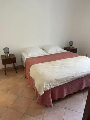 Un ou plusieurs lits dans un hébergement de l'établissement Appartement vue Mer en plein centre