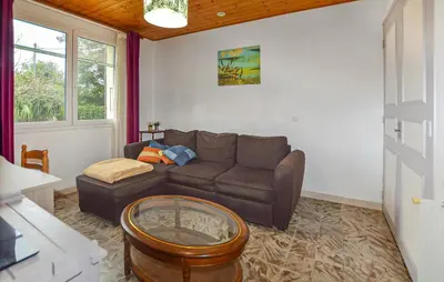 Coin salon dans l'établissement Villa Plage À Pieds