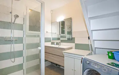 Salle de bains dans l'établissement Villa Plage À Pieds
