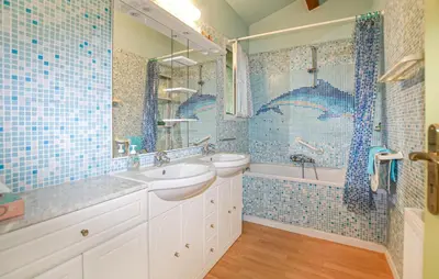 Salle de bains dans l'établissement Villa Plage À Pieds