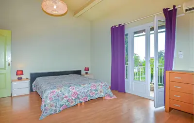 Un ou plusieurs lits dans un hébergement de l'établissement Villa Plage À Pieds