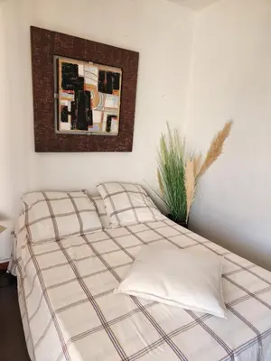 Un ou plusieurs lits dans un hébergement de l'établissement Appartement centre de calvi