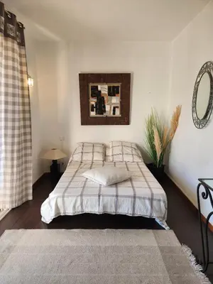 Un ou plusieurs lits dans un hébergement de l'établissement Appartement centre de calvi