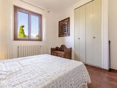 Un ou plusieurs lits dans un hébergement de l'établissement Holiday Home Casa Féminiccia by Interhome