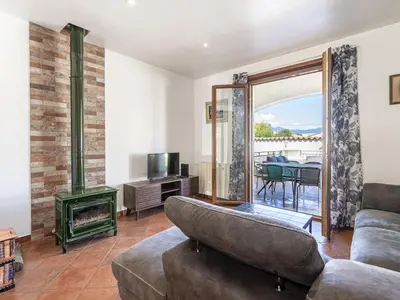 Coin salon dans l'établissement Holiday Home Casa Féminiccia by Interhome