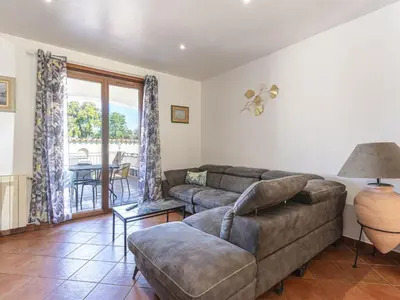 Coin salon dans l'établissement Holiday Home Casa Féminiccia by Interhome