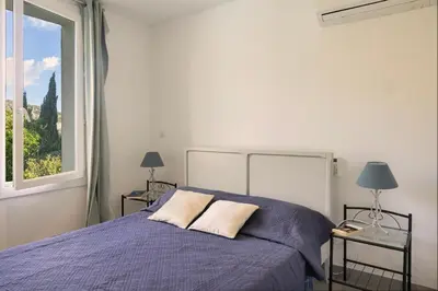 Un ou plusieurs lits dans un hébergement de l'établissement Villa ODETTE