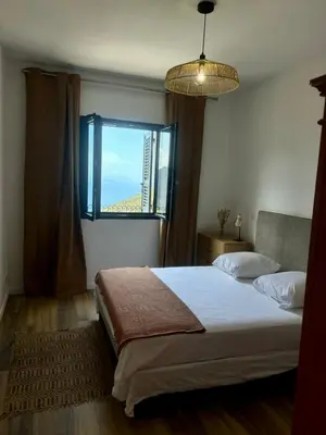 Un ou plusieurs lits dans un hébergement de l'établissement Les chambres du Cap Corse