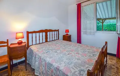 Un ou plusieurs lits dans un hébergement de l'établissement Villa Piscine Privée