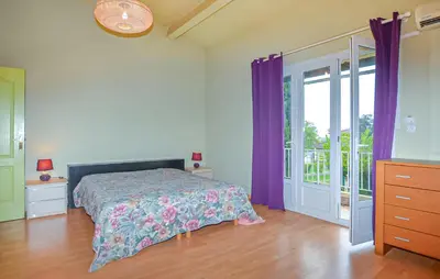 Un ou plusieurs lits dans un hébergement de l'établissement Villa Piscine Privée