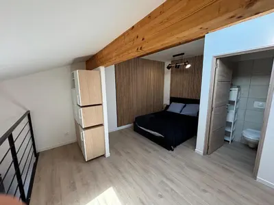 Un ou plusieurs lits dans un hébergement de l'établissement LA MARANA - 1 minute des plages - Proche BASTIA AEROPORT - T2 entièrement neuf avec cuisine équipée