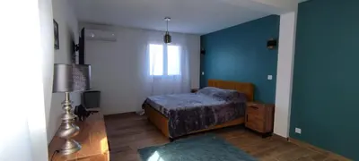 Un ou plusieurs lits dans un hébergement de l'établissement Villa Viktoriia