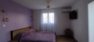 Un ou plusieurs lits dans un hébergement de l'établissement Villa Viktoriia