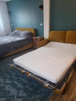 Un ou plusieurs lits dans un hébergement de l'établissement Villa Viktoriia