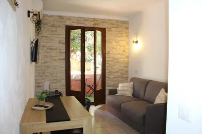 Coin salon dans l'établissement Terra Corsa Duplex T2