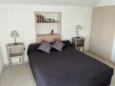 Un ou plusieurs lits dans un hébergement de l'établissement Nonza vue sur mer