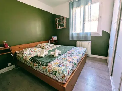 Un ou plusieurs lits dans un hébergement de l'établissement Appartement familial - Vue mer