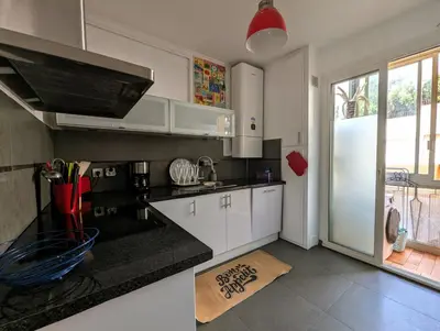 Cuisine ou kitchenette dans l'établissement Appartement familial - Vue mer