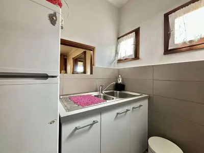 Salle de bains dans l'établissement Studio Résidence de La Mer L'ILE-ROUSSE