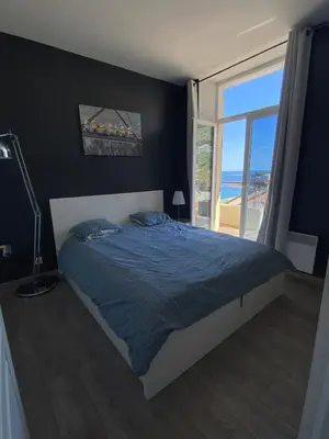 Un ou plusieurs lits dans un hébergement de l'établissement Casa Sanna, T2 waterfront Miomo, Cap Corse