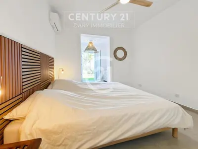 Un ou plusieurs lits dans un hébergement de l'établissement Superbe appartement T4 vue mer - Calvi