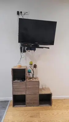 Télévision ou salle de divertissement dans l'établissement Appartement Giannoni