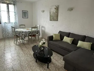 Coin salon dans l'établissement Appartement convivial à Marignana, proche de la nature